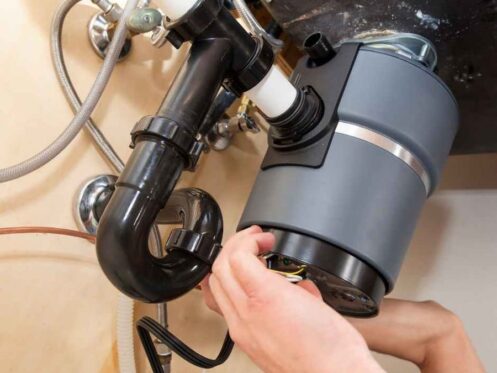 Working on a garbage disposal